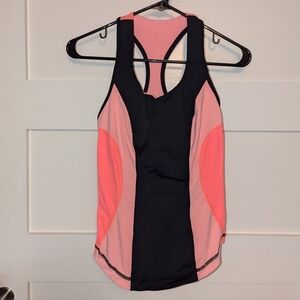 Women's Lululemon Athletica orange and black razor back tank top size 6.